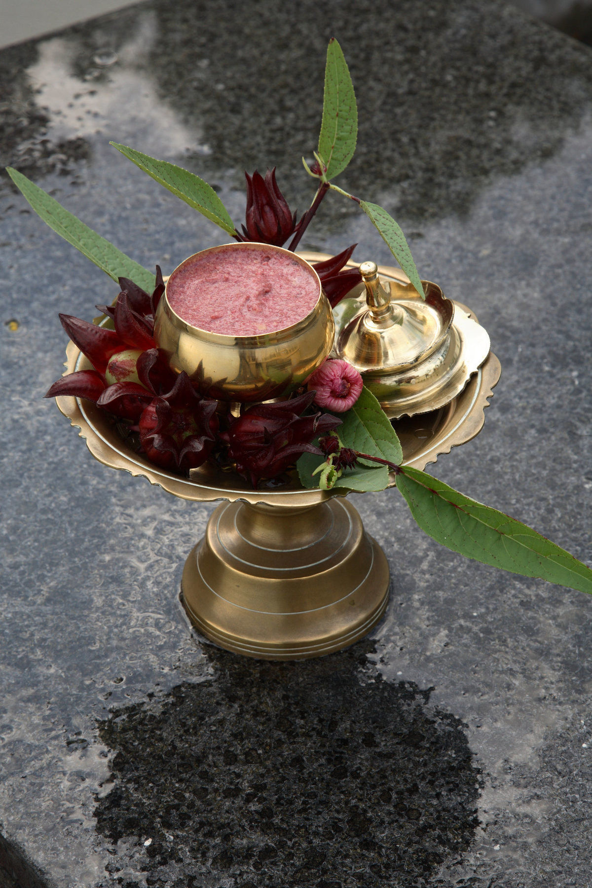 Tanjong Jara Resort, Terengganu - A Small Luxury Hotels Of The World Dungun Exterior photo A brass thali with a bell, flowers and a pot of halwa